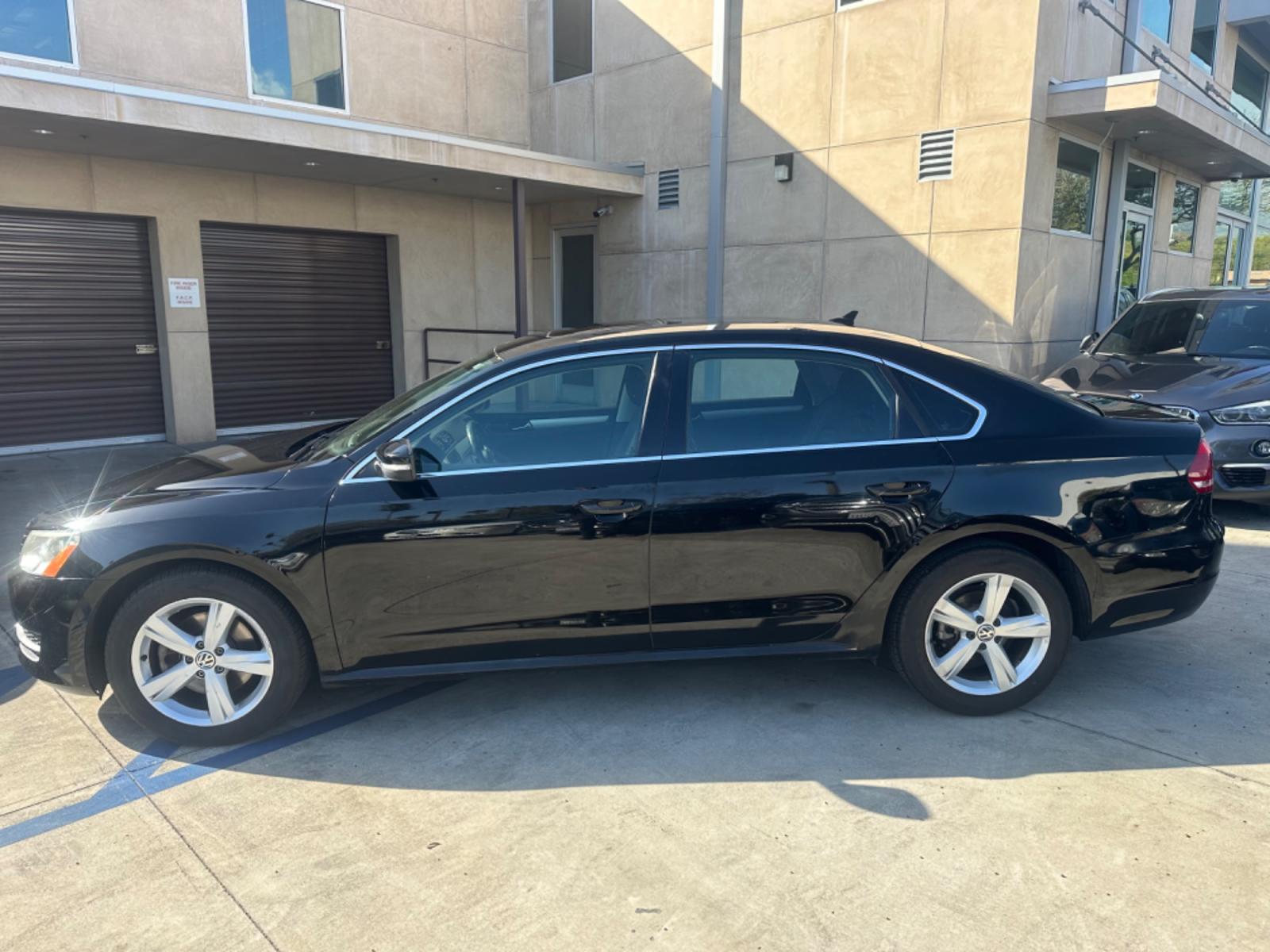 2013 Black /BLACK Volkswagen Passat (1VWBP7A30DC) , located at 30 S. Berkeley Avenue, Pasadena, CA, 91107, (626) 248-7567, 34.145447, -118.109398 - Low Miles!! Crown City Motors is a used “Buy Here Pay Here” car dealer in Pasadena CA. “Buy Here Pay Here” financing, means that when you purchase your vehicle from our dealership, that you make the payments to the dealership as well. We do not need the banks approval to get you approved - Photo #2